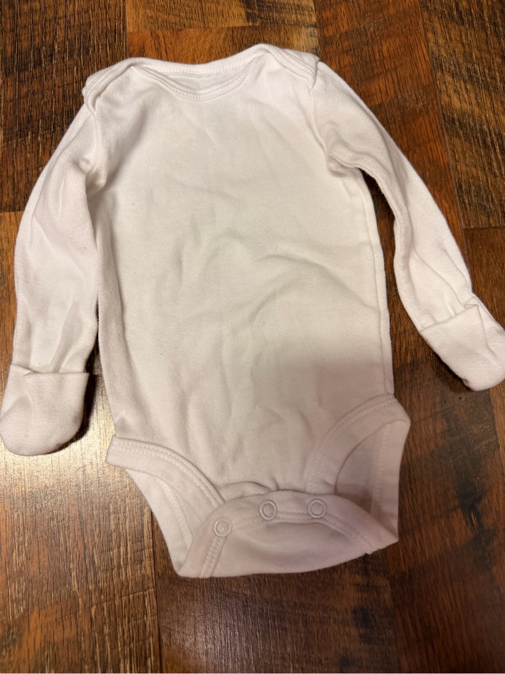 3 Carter's White Long-Sleeve Baby Bodysuit’s